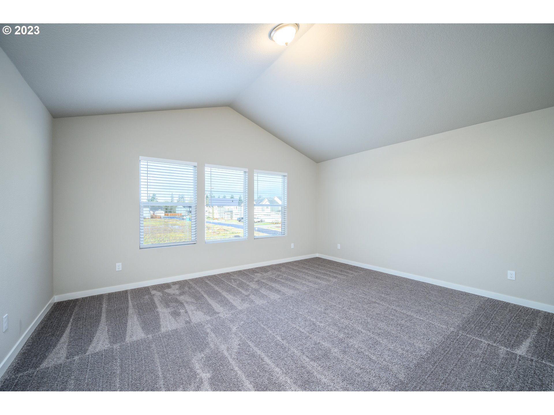 3080 South Kodiak Street, Unit LT813 Cornelius, OR 97113 - Photo 16 of 37 a view of an empty room with a window