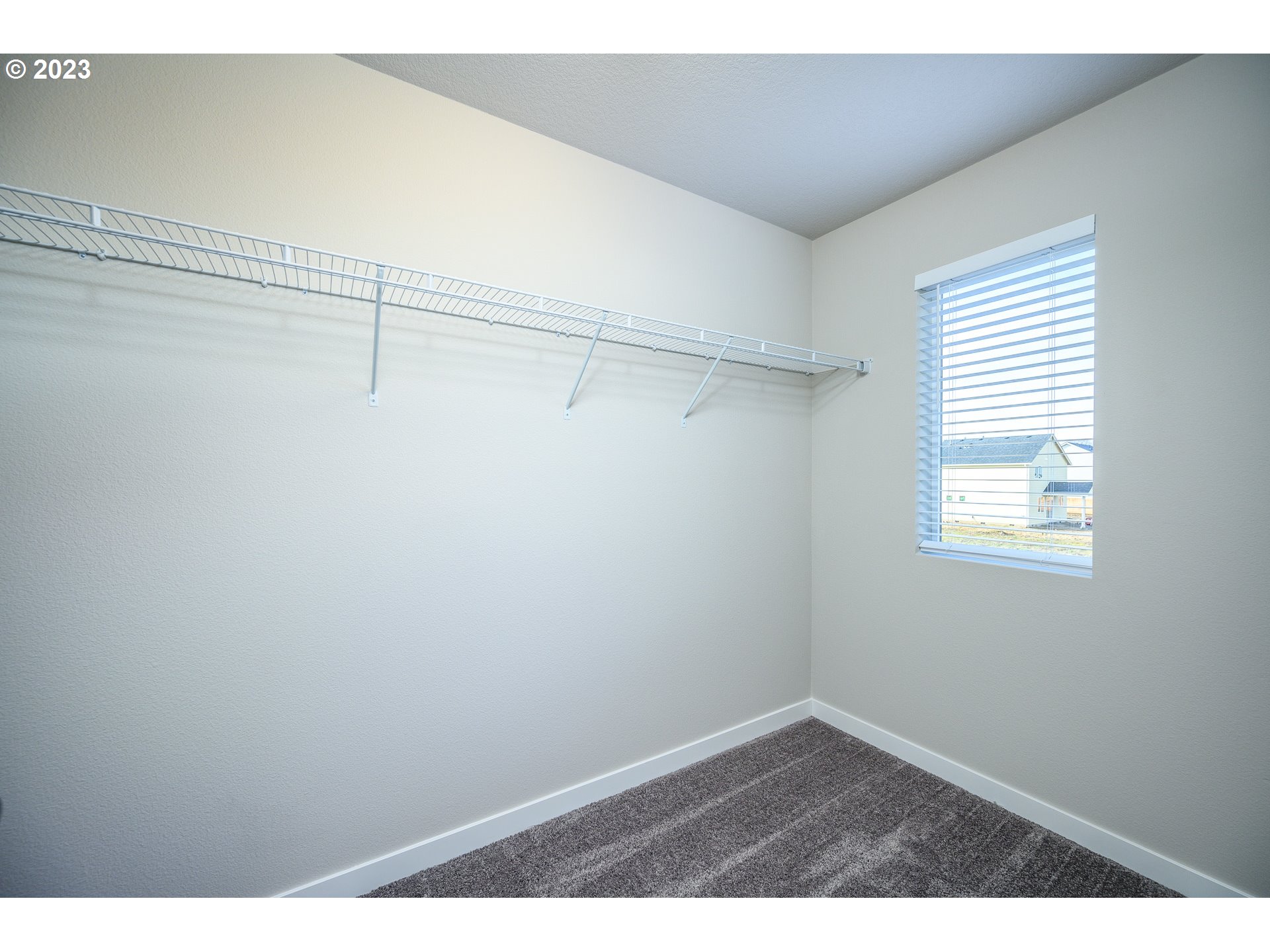 3080 South Kodiak Street, Unit LT813 Cornelius, OR 97113 - Photo 17 of 37 a view of small space with racks on the wall