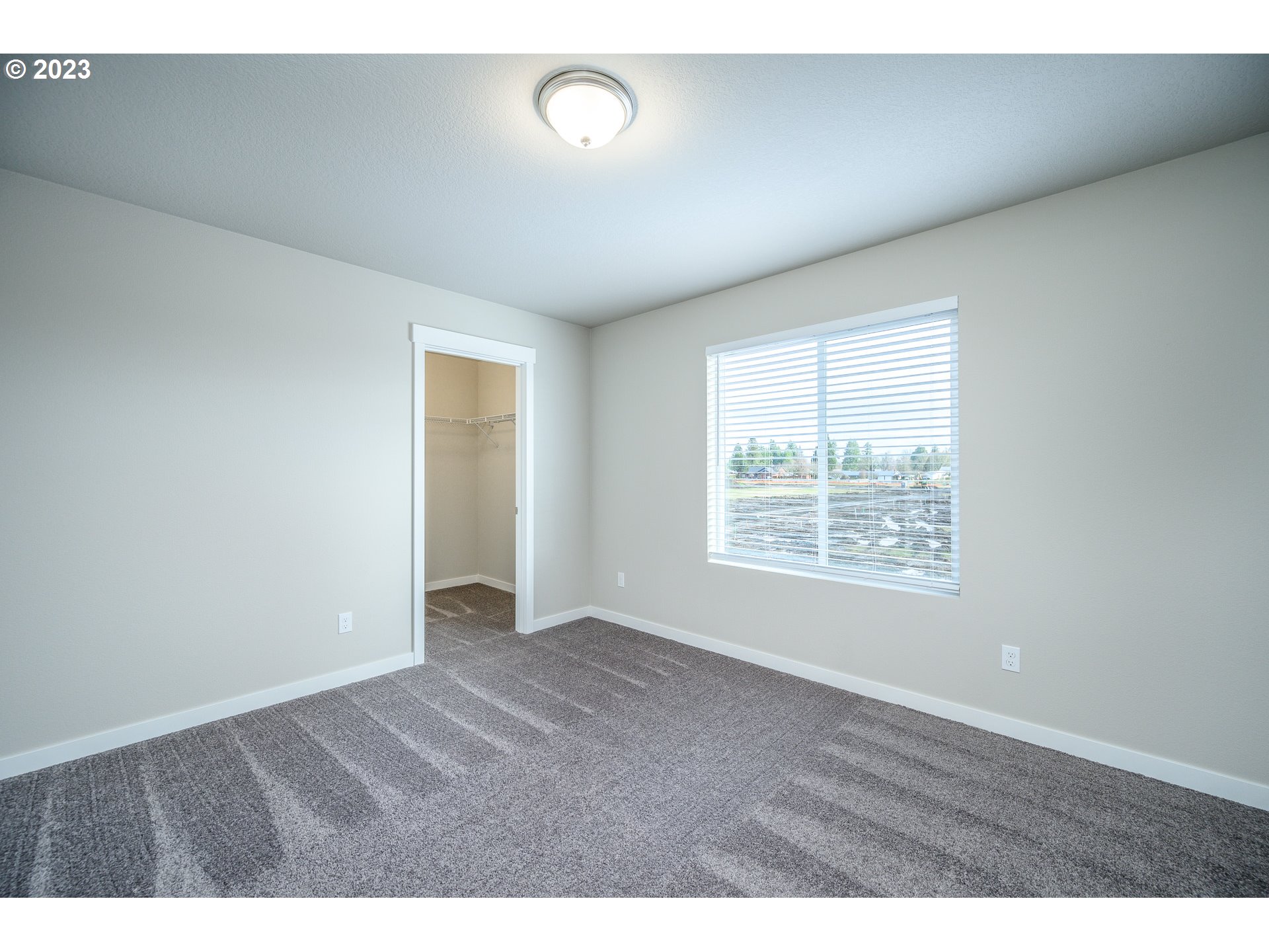 3080 South Kodiak Street, Unit LT813 Cornelius, OR 97113 - Photo 28 of 37 a view of an empty room with a window