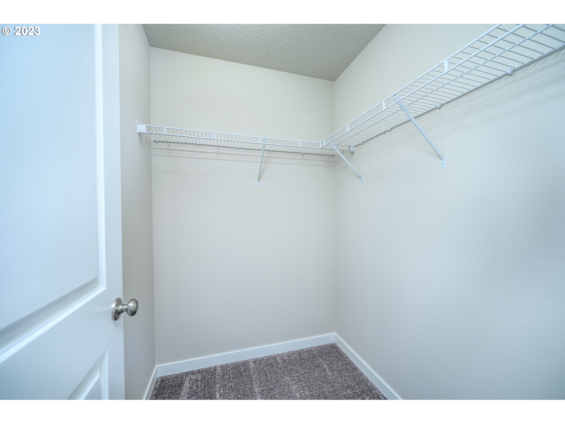 3080 South Kodiak Street, Unit LT813 Cornelius, OR 97113 - Photo 30 of 37 a view of an empty walk in closet