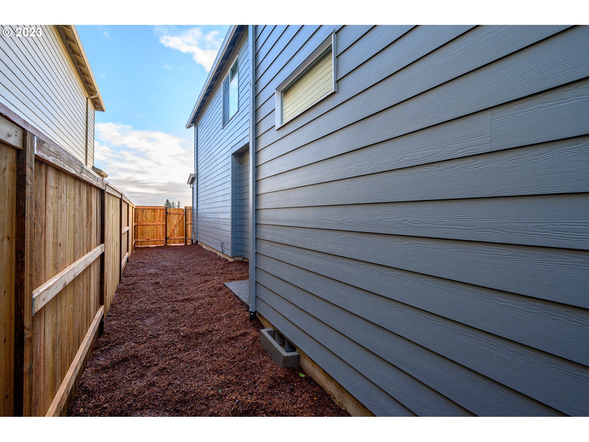 3080 South Kodiak Street, Unit LT813 Cornelius, OR 97113 - Photo 33 of 37 a view of a house with a backyard
