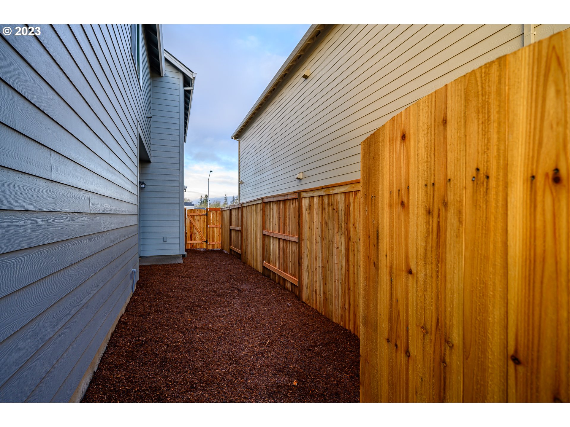 3080 South Kodiak Street, Unit LT813 Cornelius, OR 97113 - Photo 36 of 37 a view of a pathway with a backyard