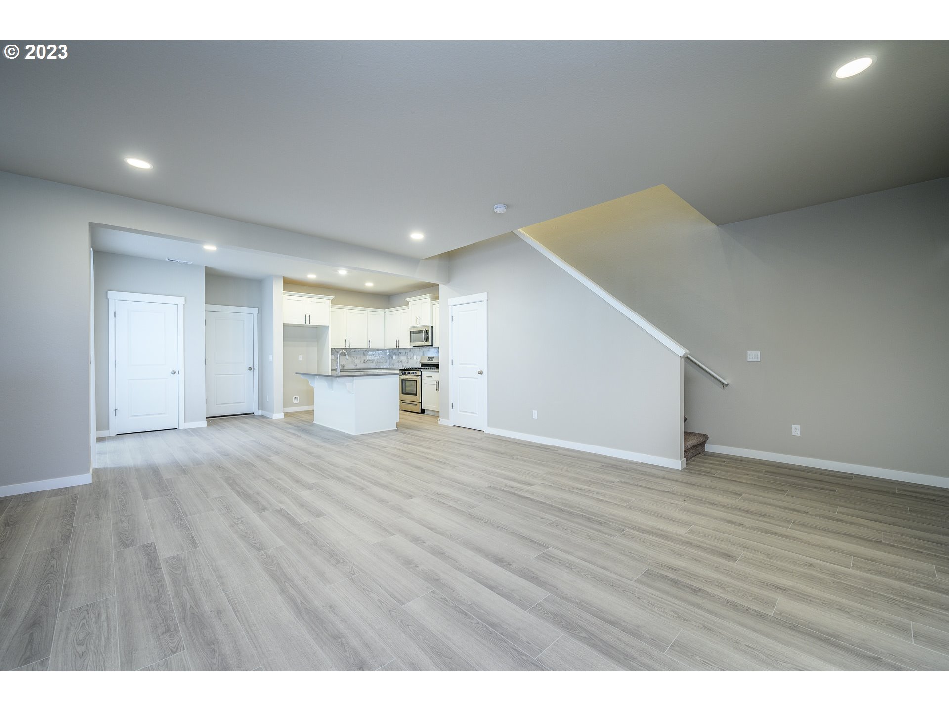 3080 South Kodiak Street, Unit LT813 Cornelius, OR 97113 - Photo 9 of 37 a view of empty room with wooden floor