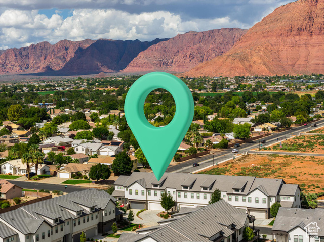 2600 Ocotillo Way, Unit 34 Santa Clara, UT 84765 - Photo 37 of 43 Aerial perspective of suburban area with mountains