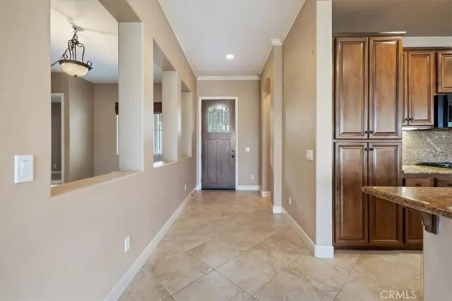 a spacious bathroom with a tub sink and mirror