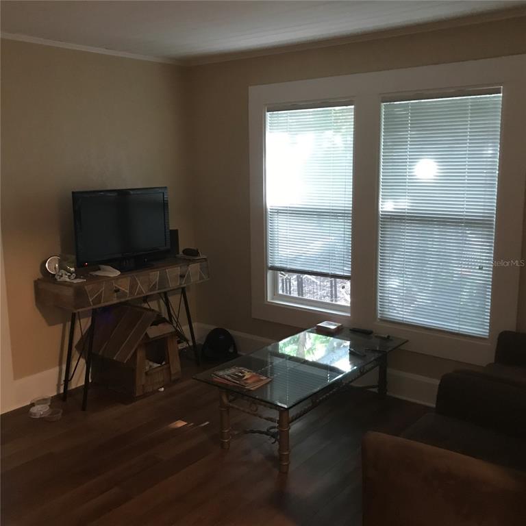 3630 38th Avenue North St. Petersburg, FL 33713 - Photo 8 of 17 a living room with furniture and a window