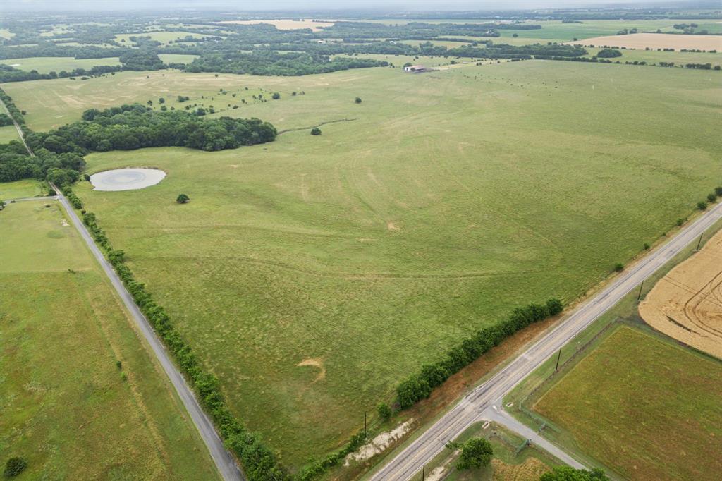 Tbd Tbd Fm-697 Whitewright, TX 75491 - Photo 3 of 19 a view of a lake from a balcony