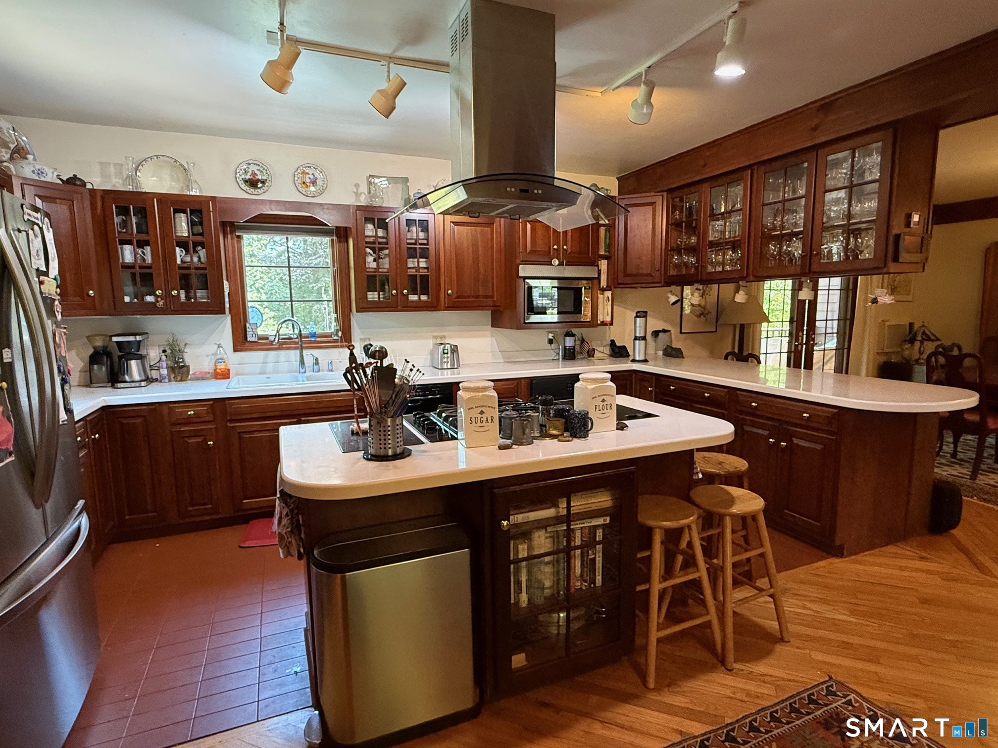 8 Ivy Road Stonington, CT 06355 - Photo 16 of 30 a kitchen with a sink appliances and cabinets