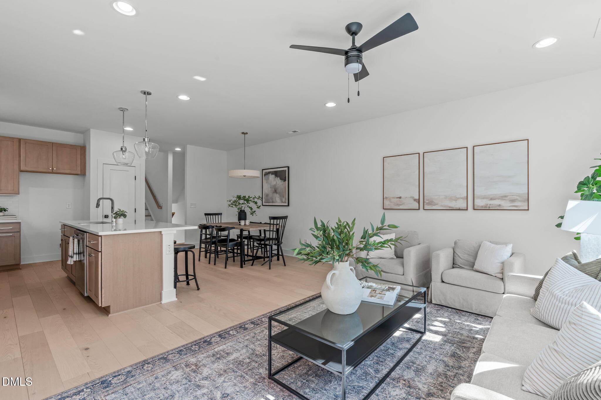 610 Rocky Knob Court Raleigh, NC 27601 - Photo 10 of 48 a living room with furniture and a table