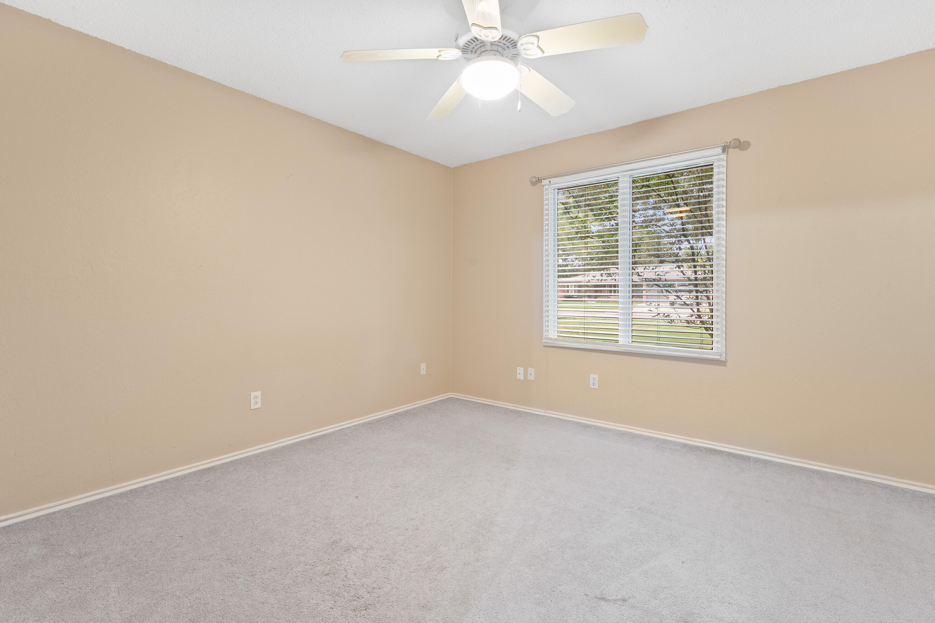 4403 78th Street Lubbock, TX 79424 - Photo 20 of 29 an empty room with a window