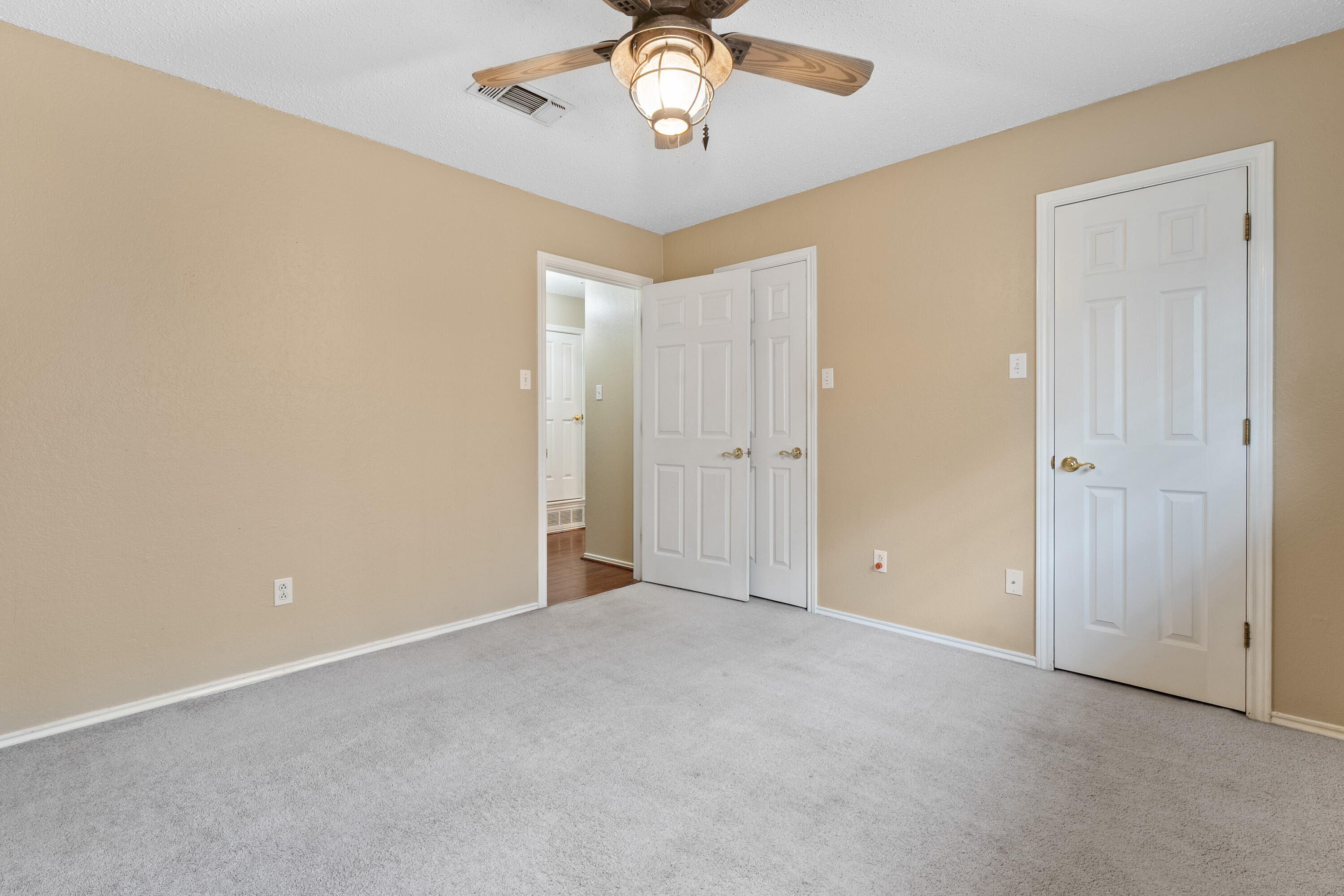 4403 78th Street Lubbock, TX 79424 - Photo 22 of 29 a view of an empty room with a window