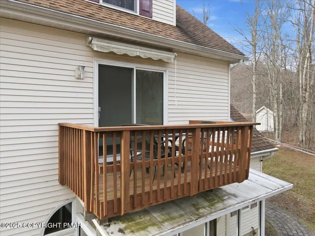 a bathroom with a sink mirror and toilet
