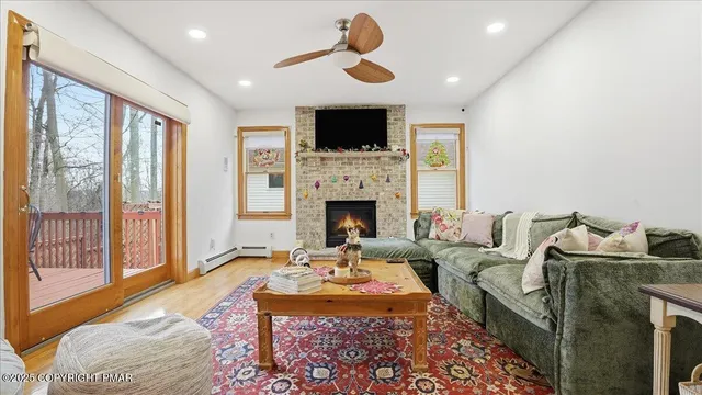 a view of living room with furniture and a window