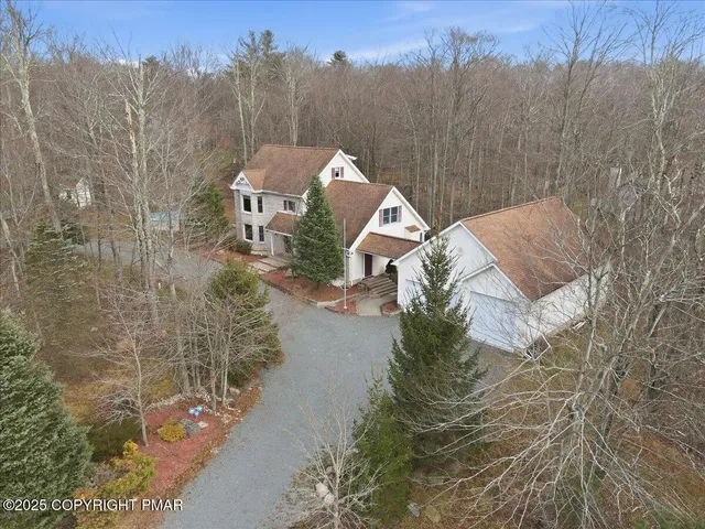 a view of a a dining room with furniture and wooden floor