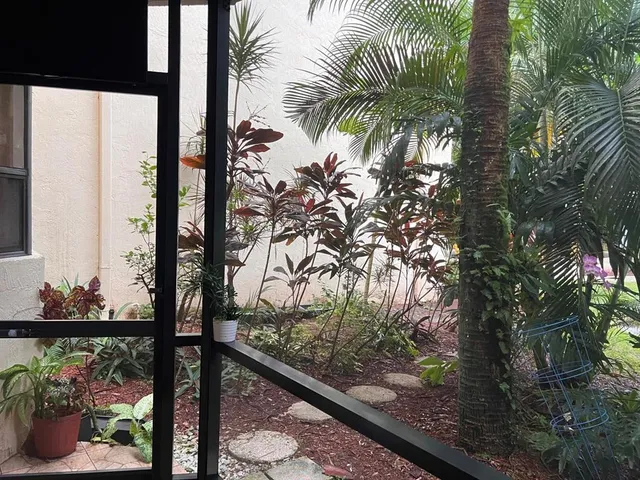 a stove top oven sitting inside of a kitchen