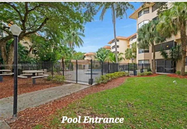 a view of a backyard with a garden