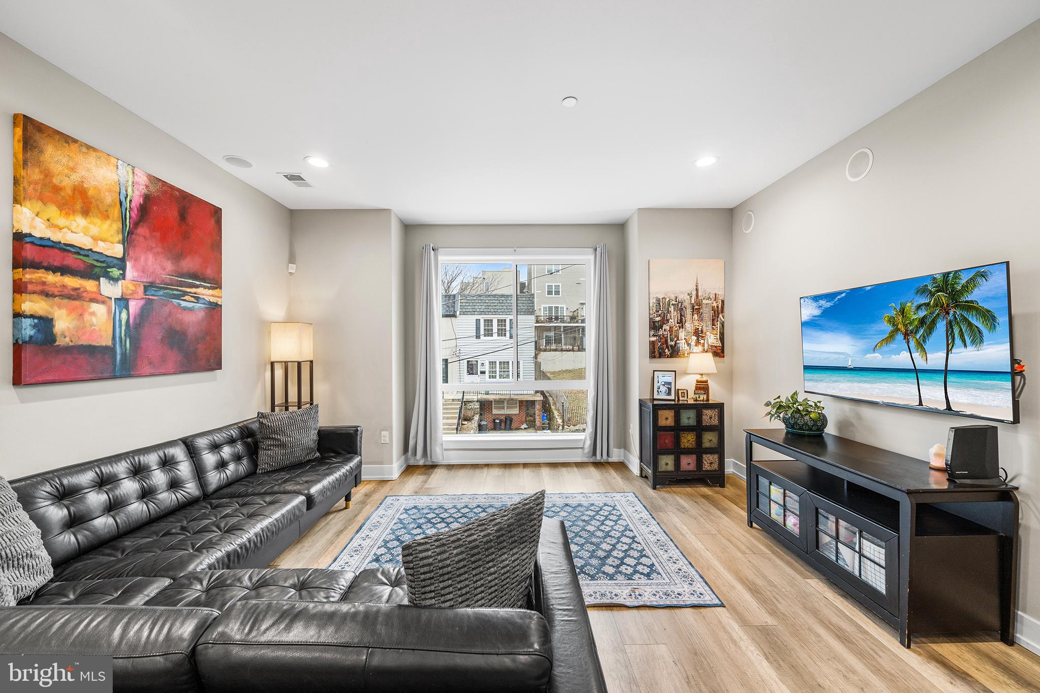 4736 Sheldon Street Philadelphia, PA 19127 - Photo 18 of 37 a living room with furniture and a flat screen tv