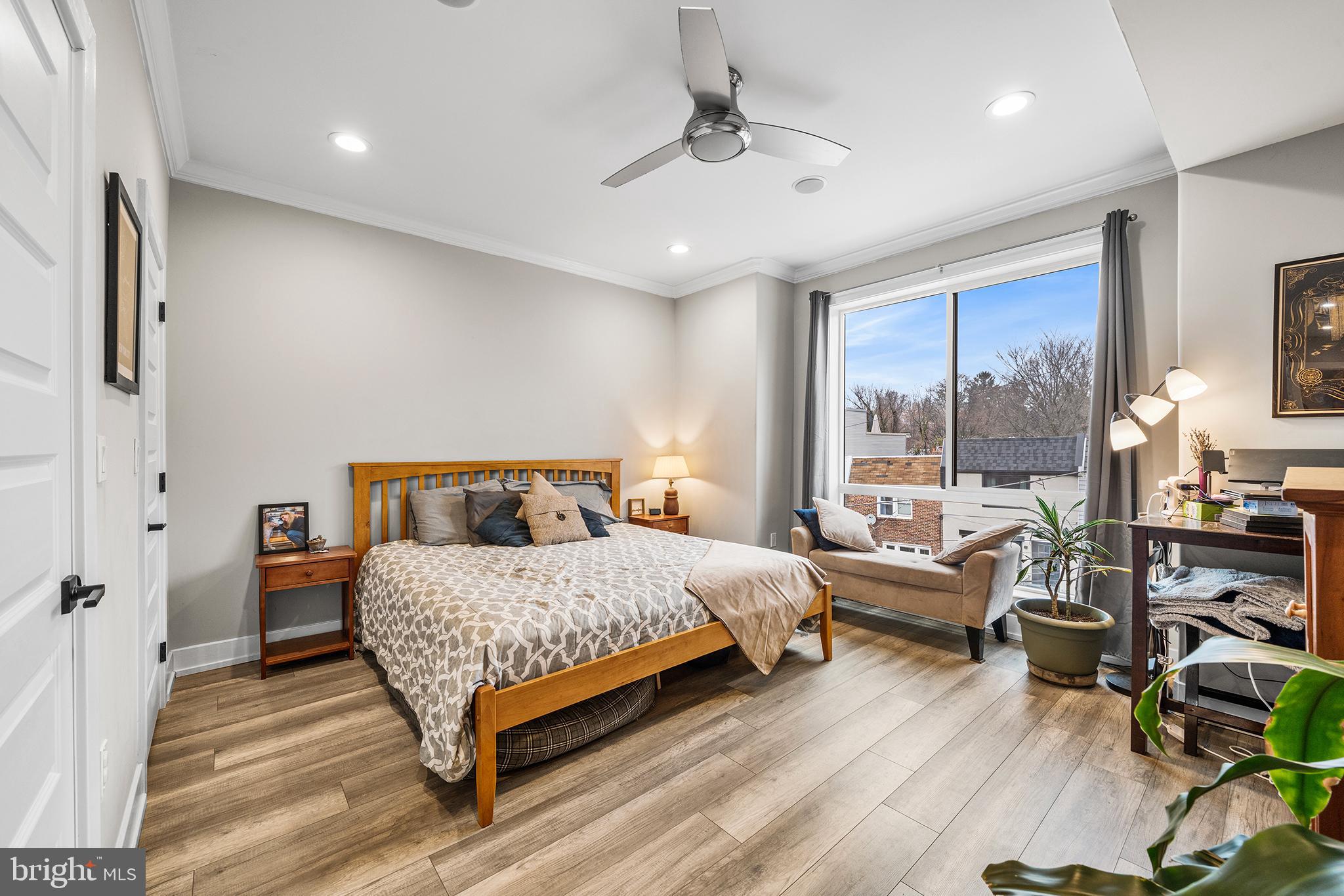 4736 Sheldon Street Philadelphia, PA 19127 - Photo 22 of 37 a bedroom with a bed and wooden floor