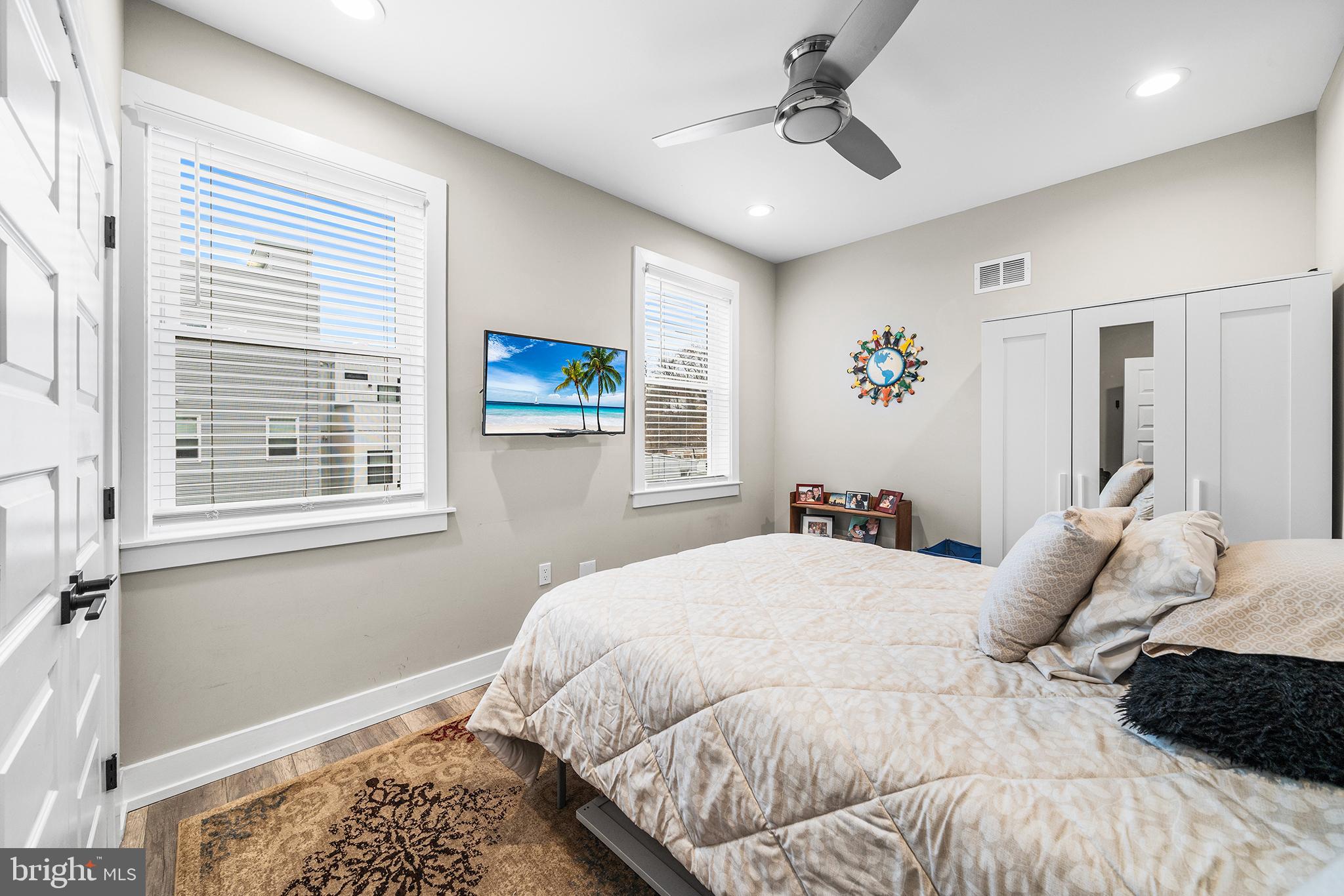 4736 Sheldon Street Philadelphia, PA 19127 - Photo 3 of 37 a bedroom with a bed dresser and a window
