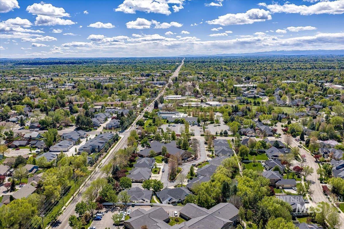 725 North Eagle Road Eagle, ID 83616 - Photo 41 of 45 Expansive aerial view showcasing a well-established residential area with abundant mature trees and a network of paved streets