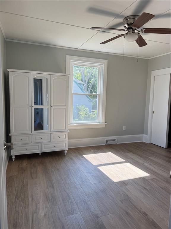 848 Ohio Avenue Monaca, PA 15061 - Photo 12 of 24 an empty room with wooden floor and windows