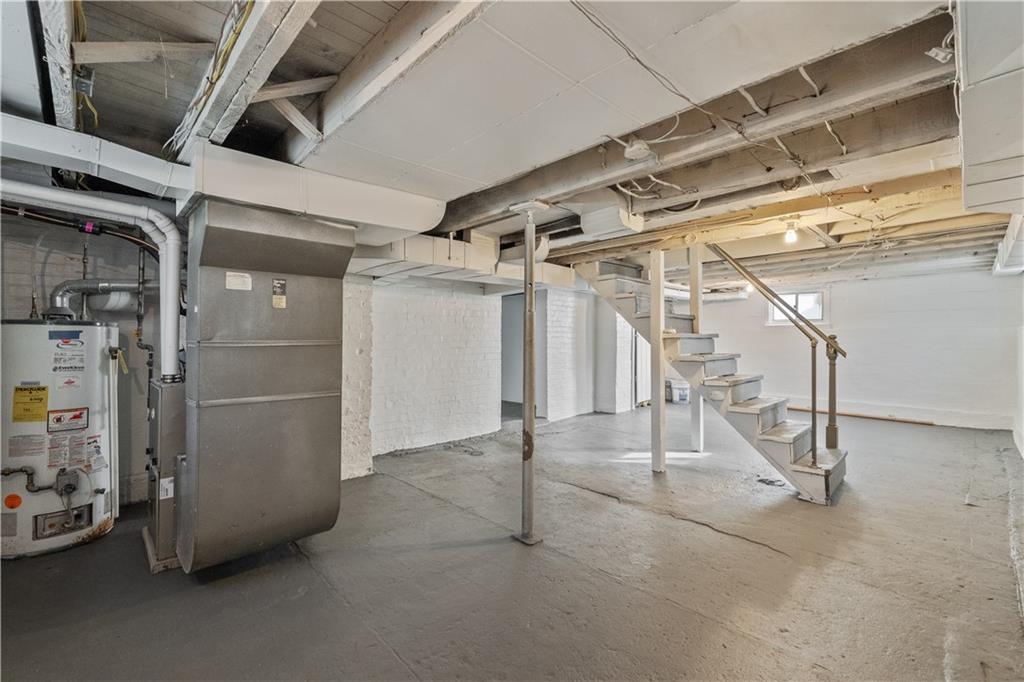 848 Ohio Avenue Monaca, PA 15061 - Photo 14 of 24 a view of an empty room with stairs