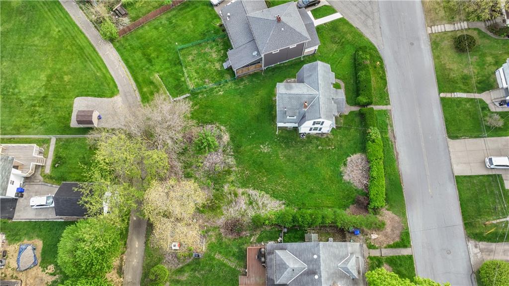 848 Ohio Avenue Monaca, PA 15061 - Photo 18 of 24 an aerial view of a house with a yard and lake view