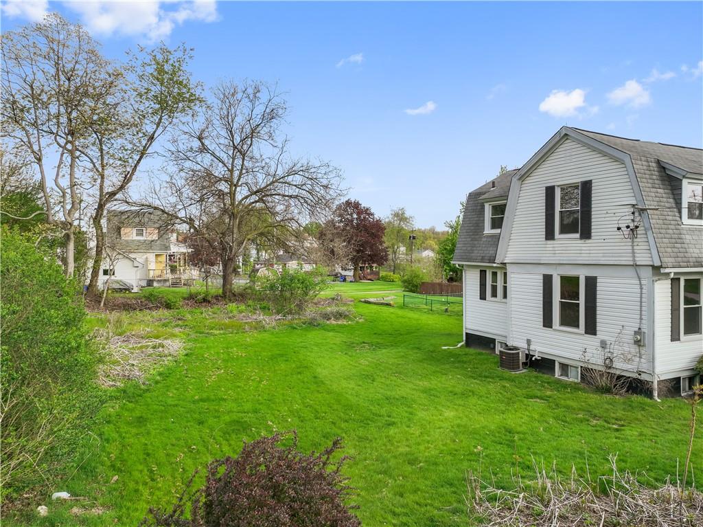 848 Ohio Avenue Monaca, PA 15061 - Photo 21 of 24 a view of a house with a yard