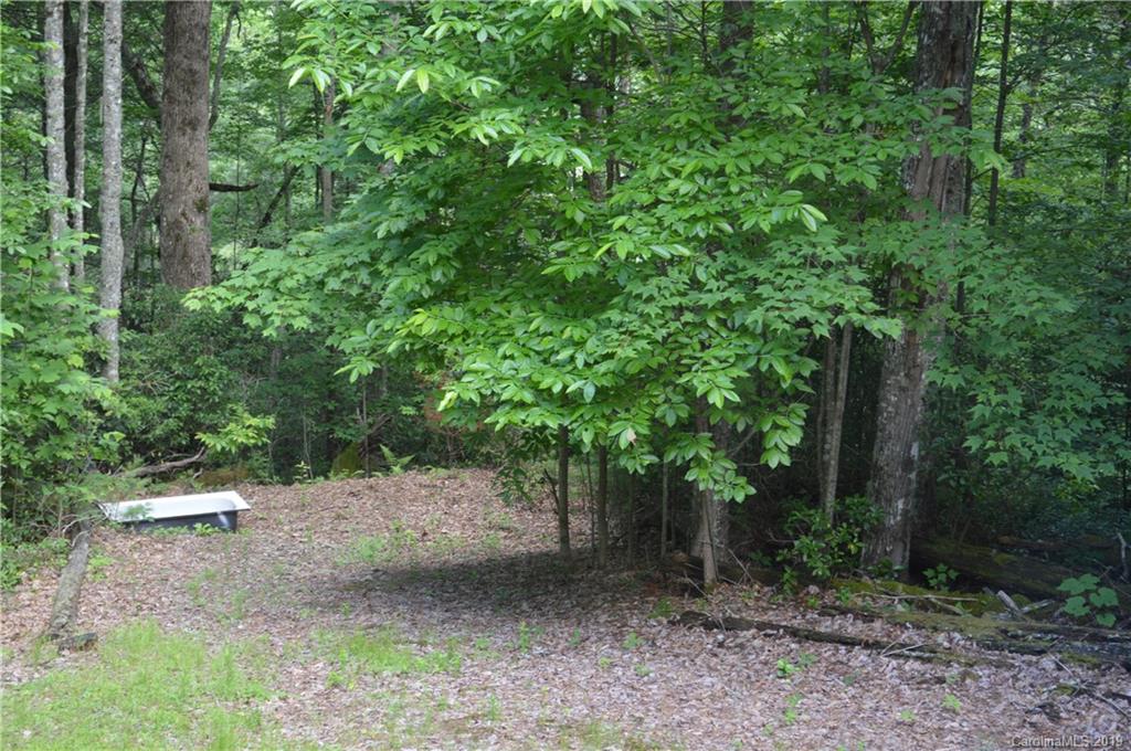 648 Sutton Road Waynesville, NC 28785 - Photo 24 of 24 a view of backyard with green space and wooden fence