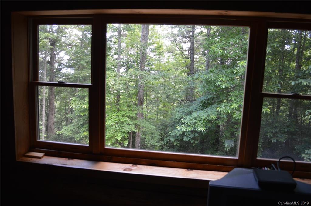 648 Sutton Road Waynesville, NC 28785 - Photo 5 of 24 a view of a window and outside view