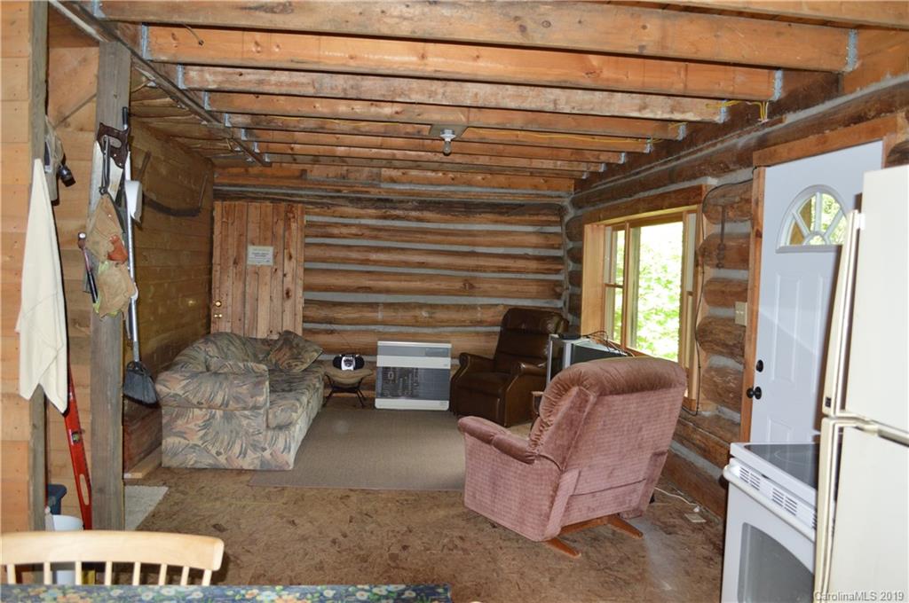 648 Sutton Road Waynesville, NC 28785 - Photo 6 of 24 a view of livingroom with furniture and a window