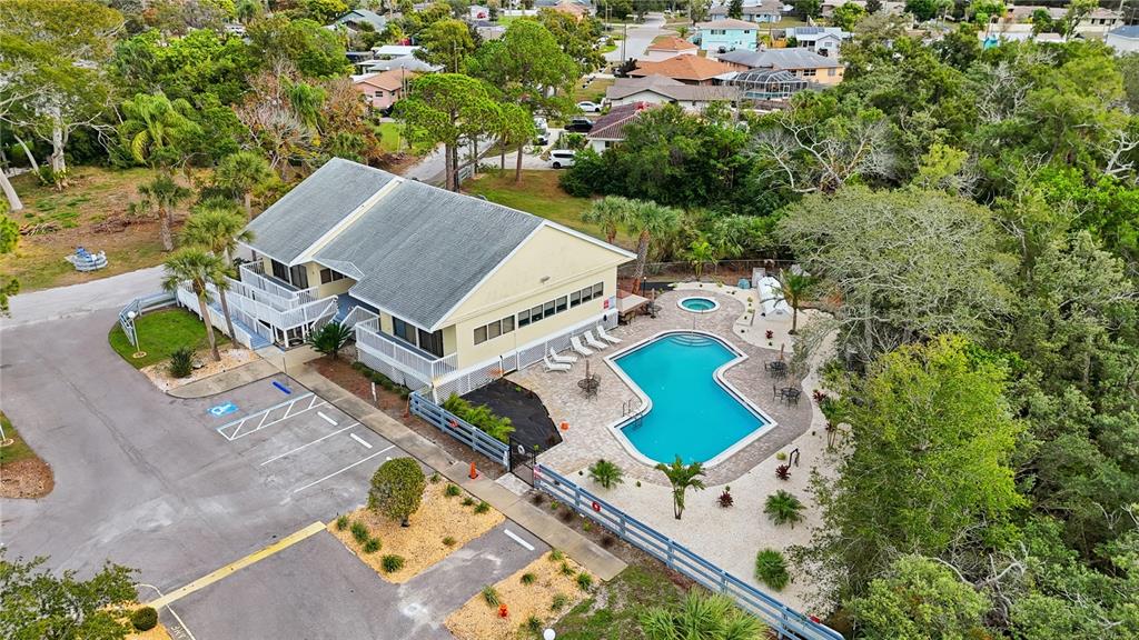 1500 Sunset Road, Unit C10 Tarpon Springs, FL 34689 - Photo 22 of 27 an aerial view of a house with outdoor space and lake view