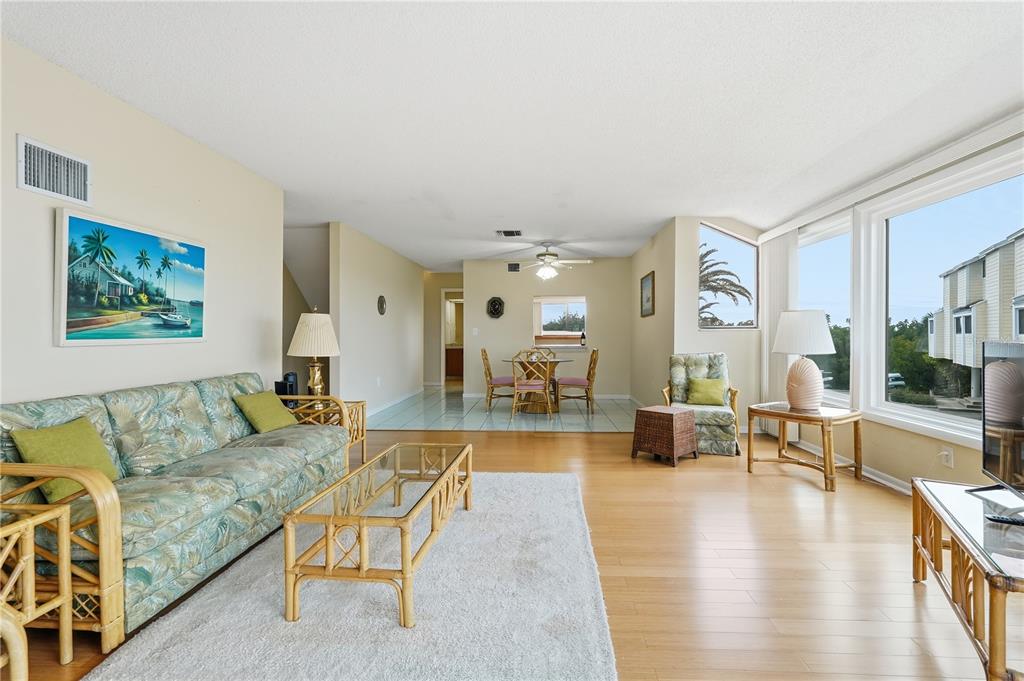 1500 Sunset Road, Unit C10 Tarpon Springs, FL 34689 - Photo 6 of 27 a living room with furniture and a large window