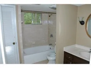 a black and white photo of a living room