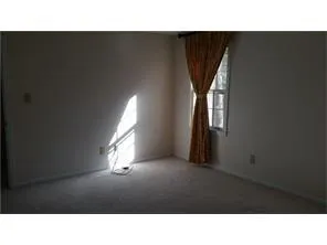 a black and white photo of a house