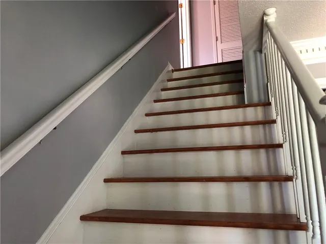 a bathroom with a tub and shower