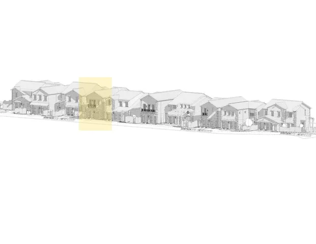 a view of a living room with a large window