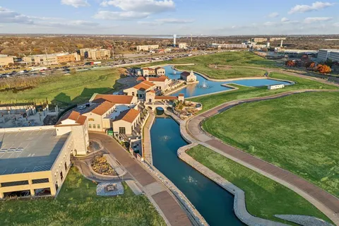 a view of a swimming pool with a garden