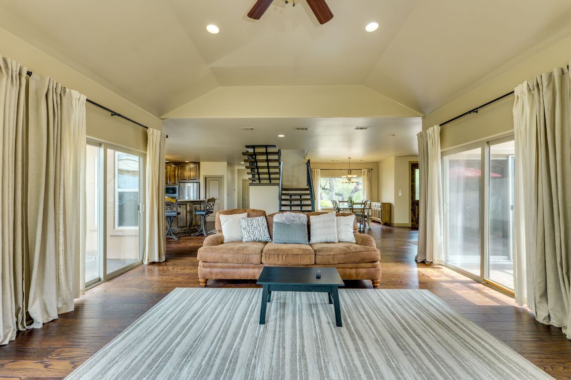 600 Mountain Dew Road Horseshoe Bay, TX 78657 - Photo 11 of 38 a living room with furniture and a wooden floor