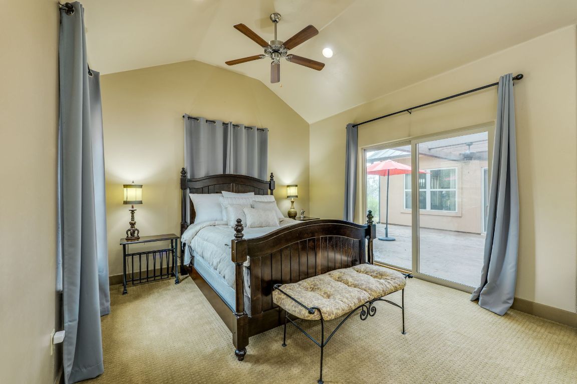 600 Mountain Dew Road Horseshoe Bay, TX 78657 - Photo 18 of 38 a bed room with a bed and a window