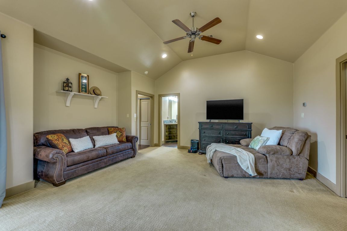 600 Mountain Dew Road Horseshoe Bay, TX 78657 - Photo 19 of 38 a living room with furniture and a flat screen tv