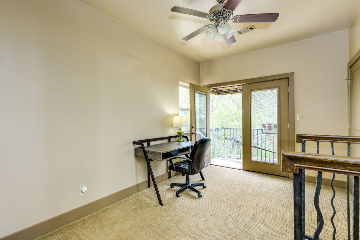 600 Mountain Dew Road Horseshoe Bay, TX 78657 - Photo 25 of 38 a living room with furniture and a large window