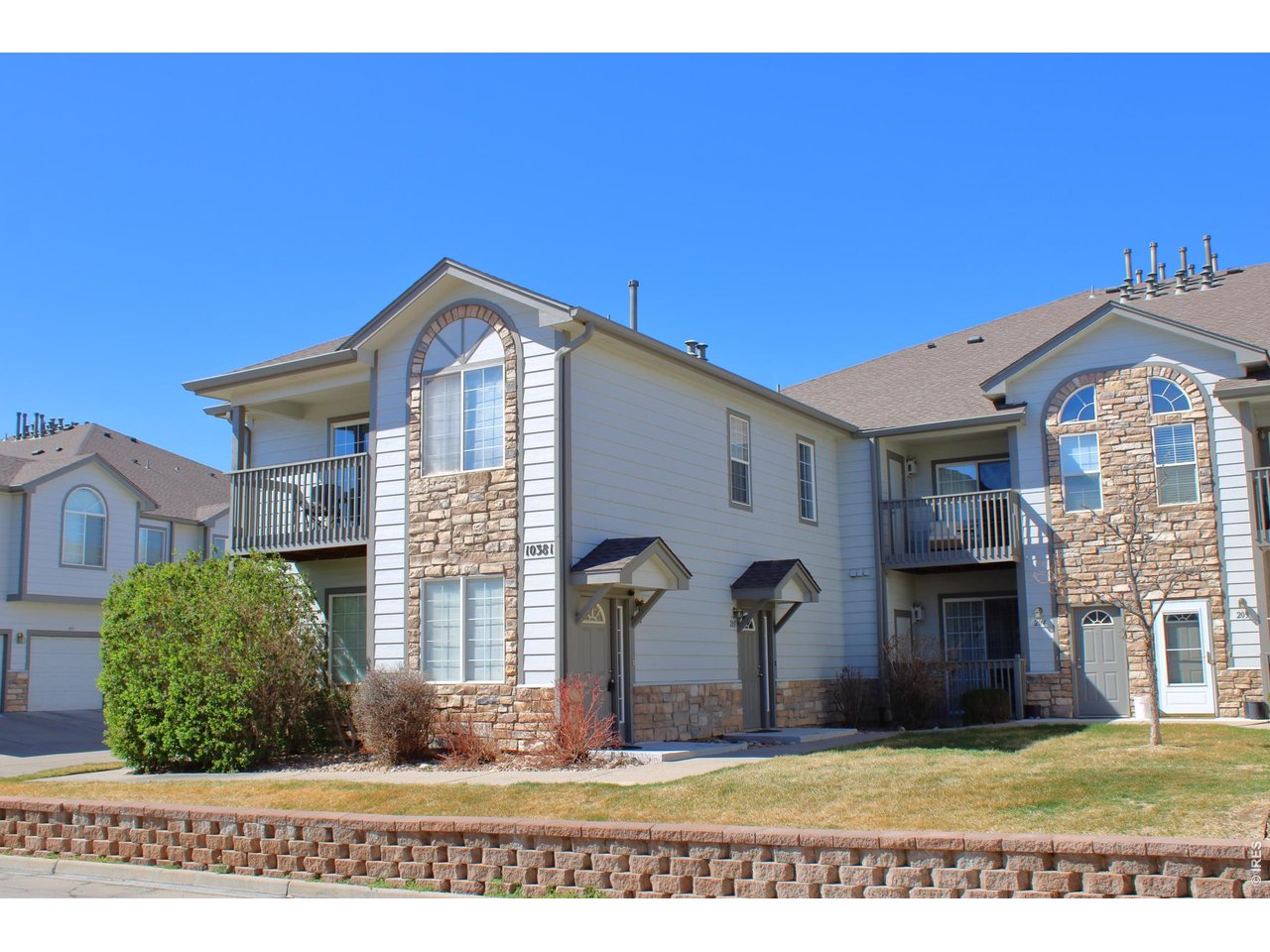 10381 Cook Way, Unit 206 Thornton, CO 80229 - Photo 12 of 39 Second floor unit with main level private entrance just off the shared courtyard.