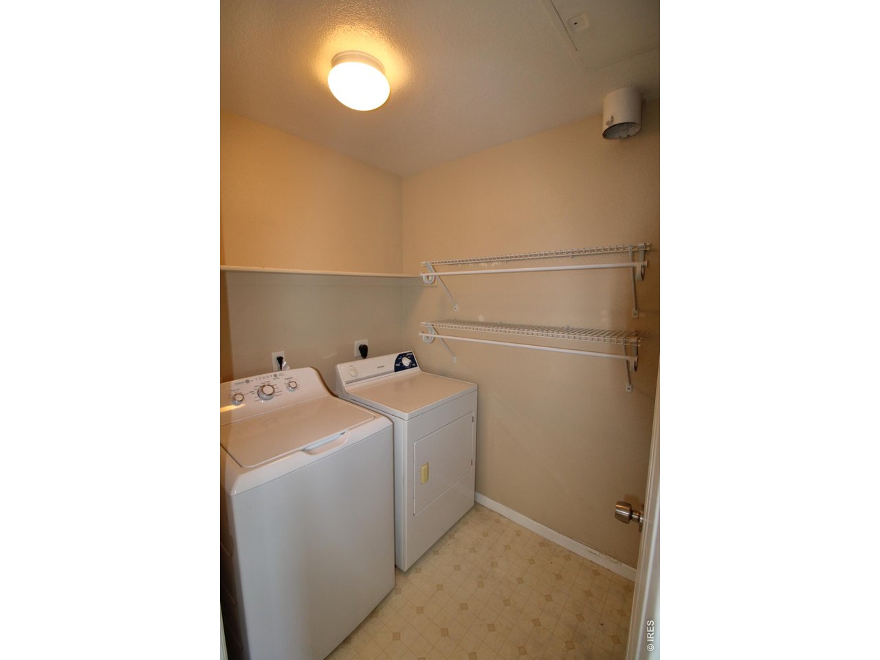 10381 Cook Way, Unit 206 Thornton, CO 80229 - Photo 10 of 39 Laundry room includes the washer and dryer.