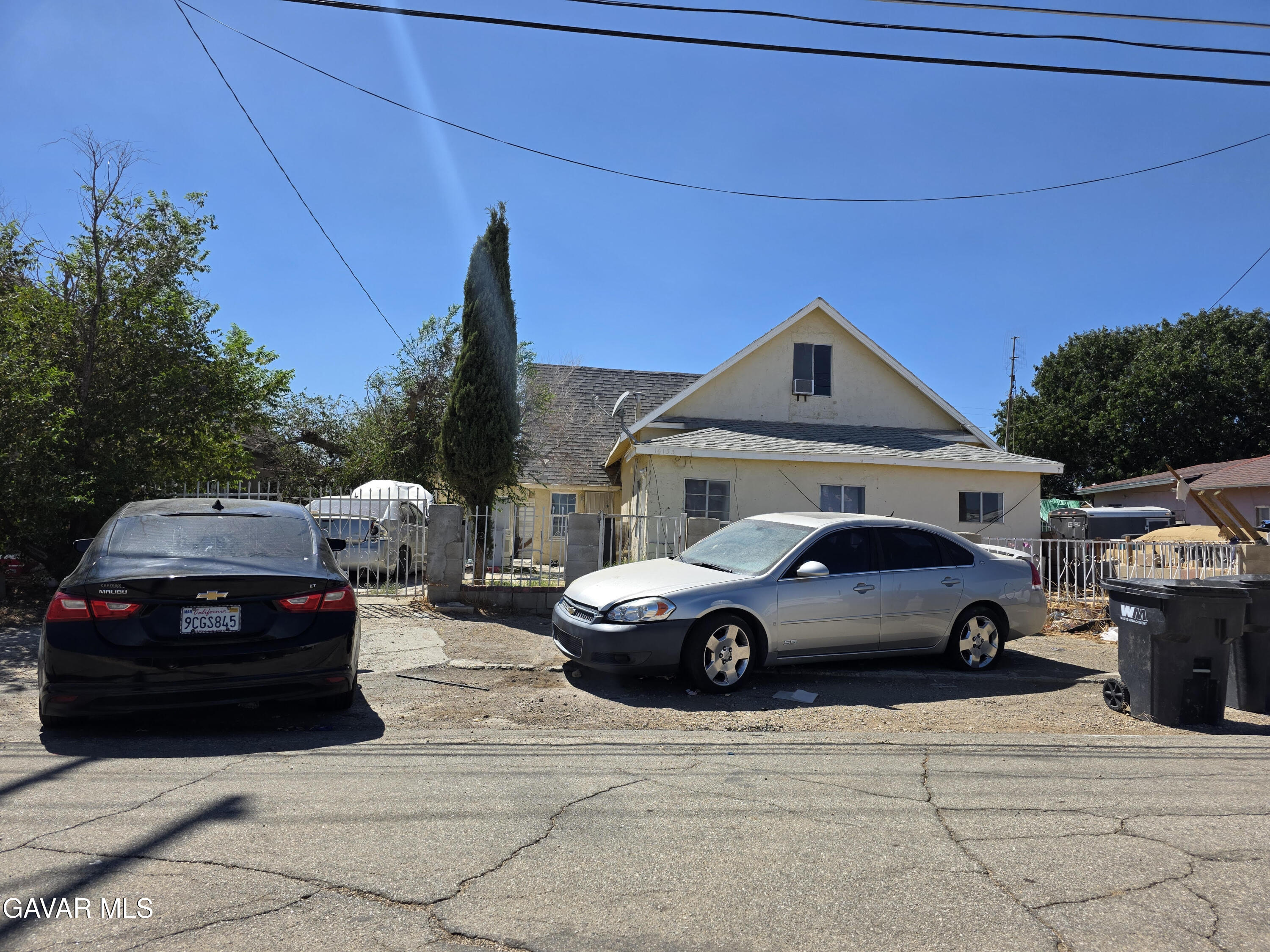 16133 I Street Mojave, CA 93501 - Photo 1 of 1 a front view of a house with parking space