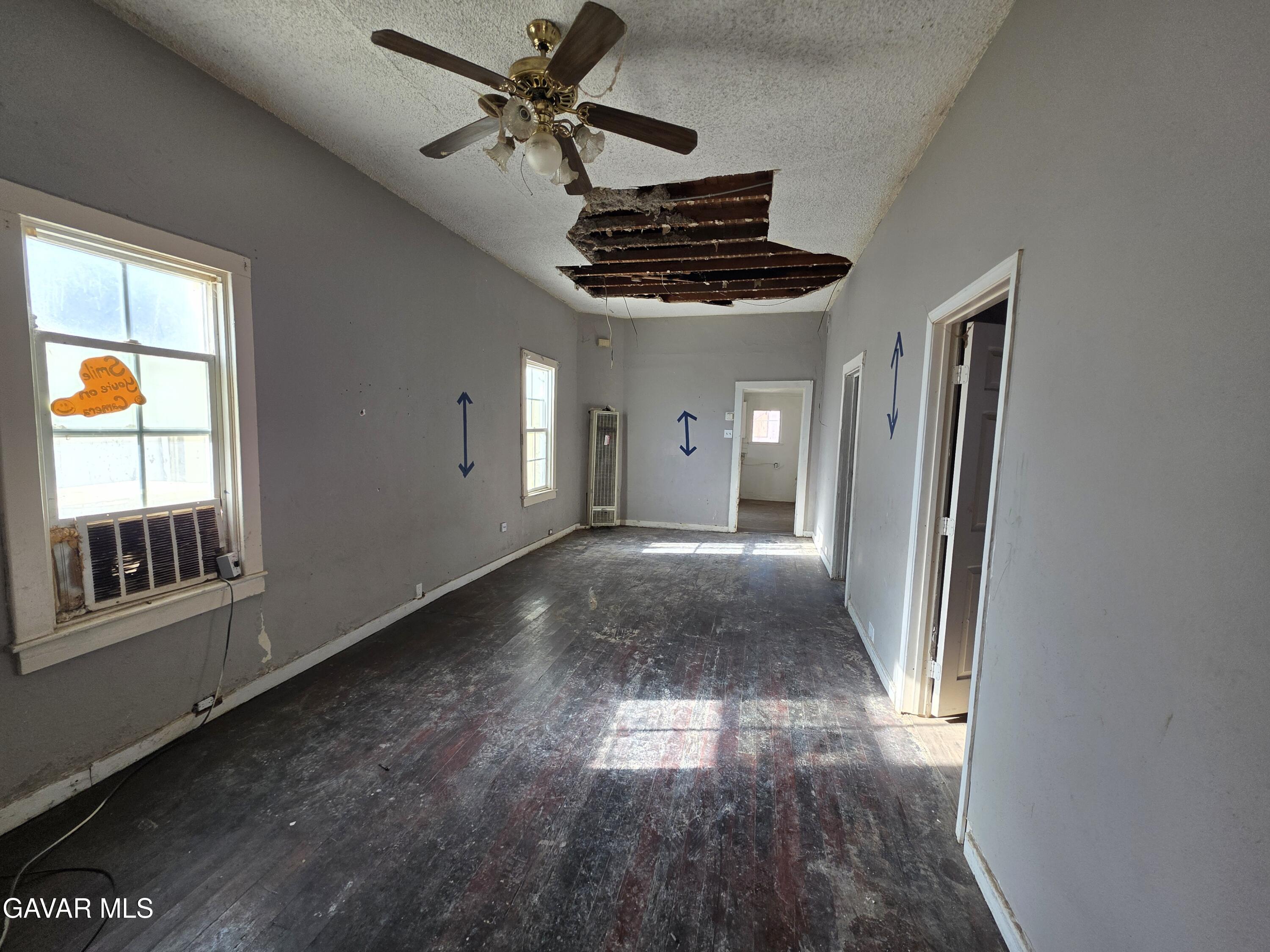 16133 I Street Mojave, CA 93501 - Photo 12 of 30 a view of entryway and hall with wooden floor