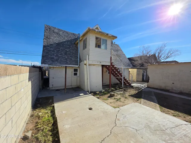 a kitchen with a stove and a cabinet