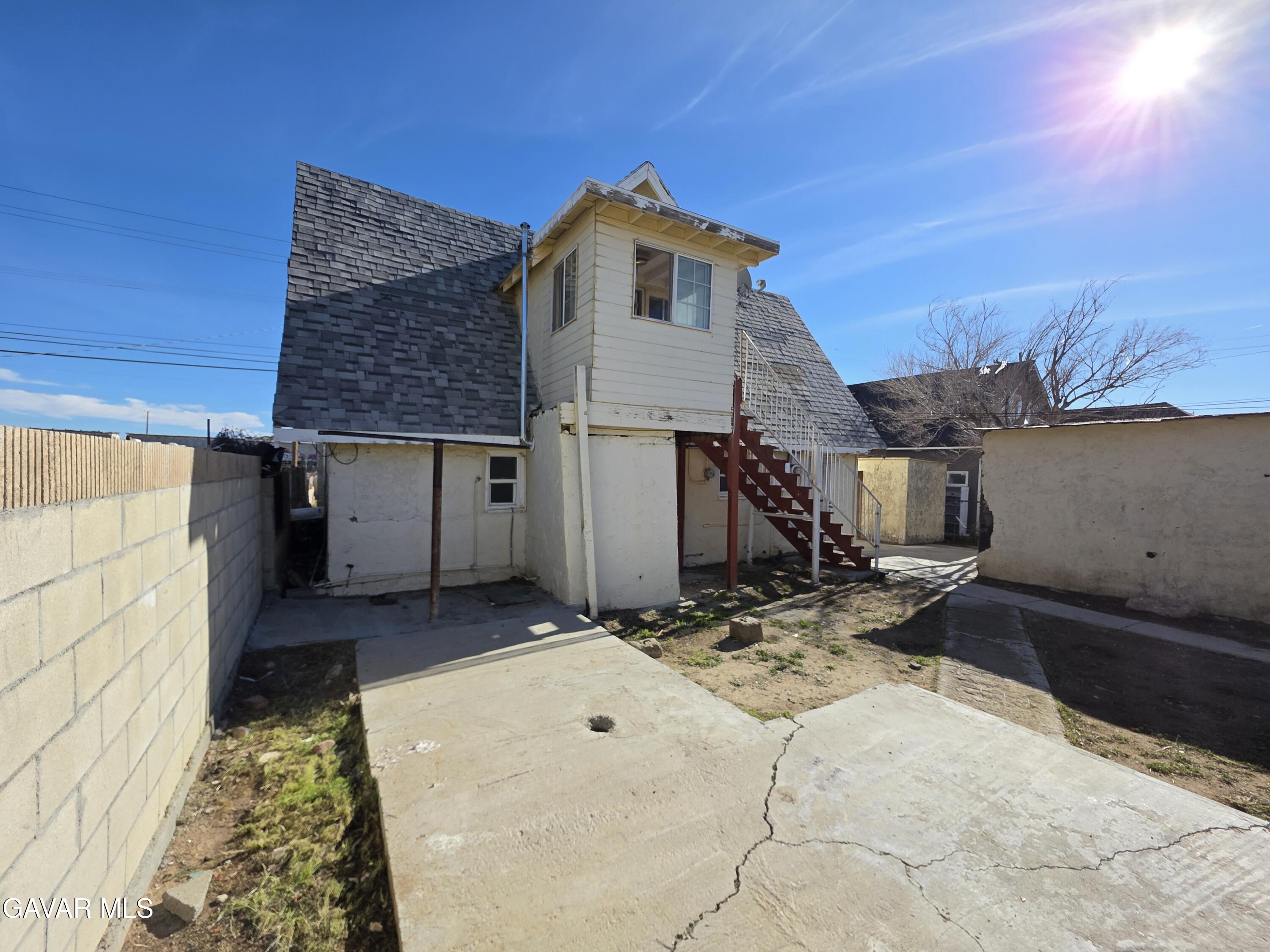 16133 I Street Mojave, CA 93501 - Photo 15 of 30 a front view of a house with yard