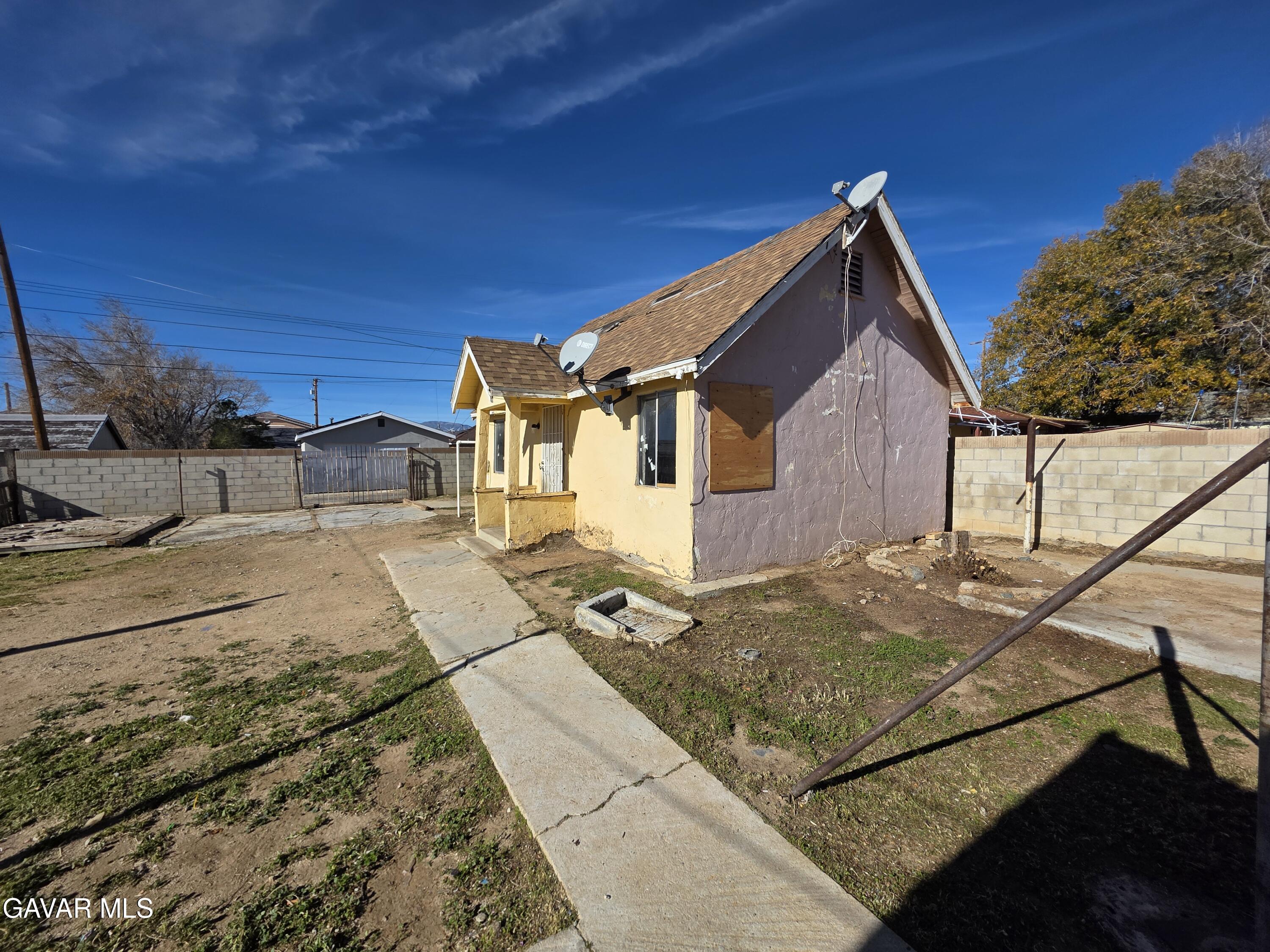 16133 I Street Mojave, CA 93501 - Photo 23 of 30 a view of a house with a patio