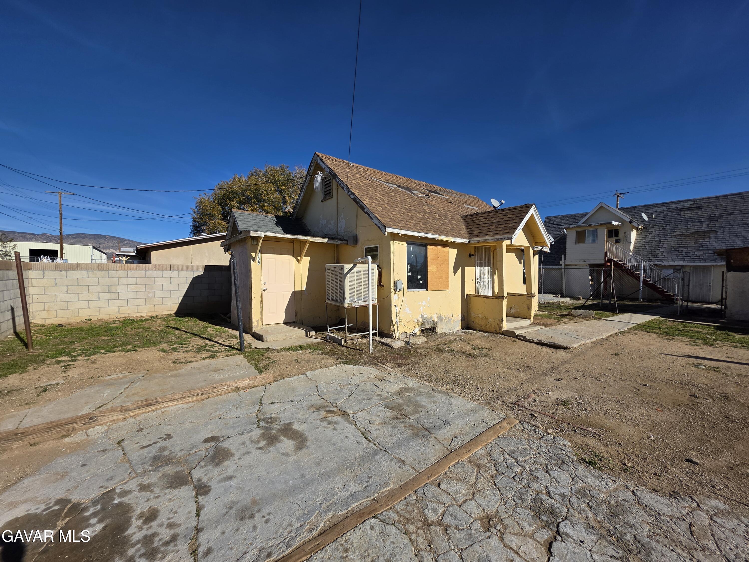 16133 I Street Mojave, CA 93501 - Photo 24 of 30 a view of a house with a patio